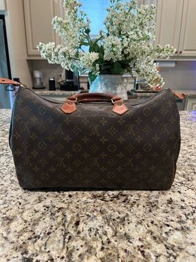 Louis Vuitton Monogram Duffel Bag in Brown and Tan